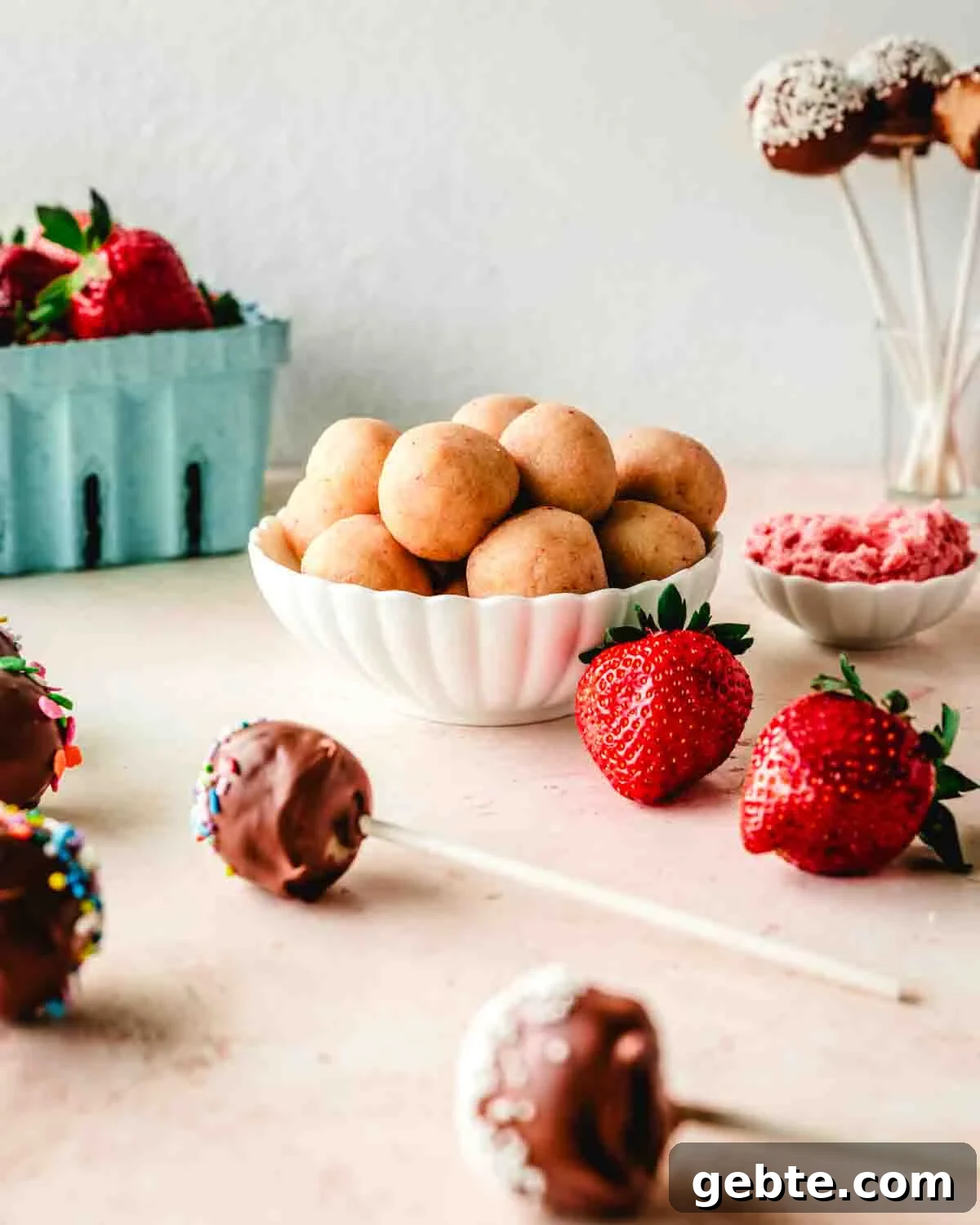 Strawberry Vanilla Cake Pops Recipe for Perfect Party Treats 8 A Pile of cake pop balls in a dish waiting to be dipped in chocolate.