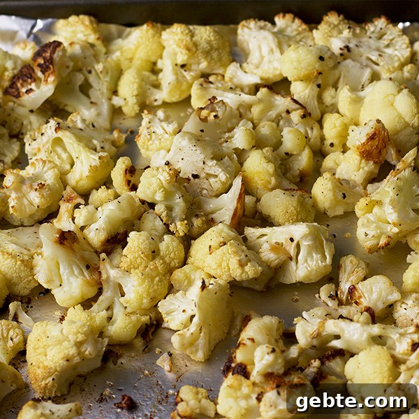 Curried Roasted Cauliflower Soup with Crispy Fried Mushrooms Recipe 5 A pan of roasted cauliflower florets.