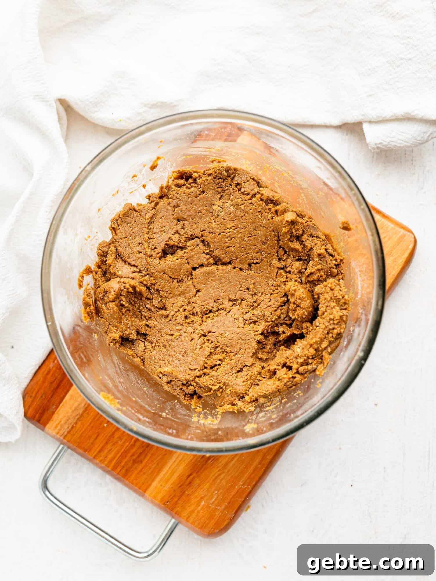 Coffee cookie dough in a glass bowl.