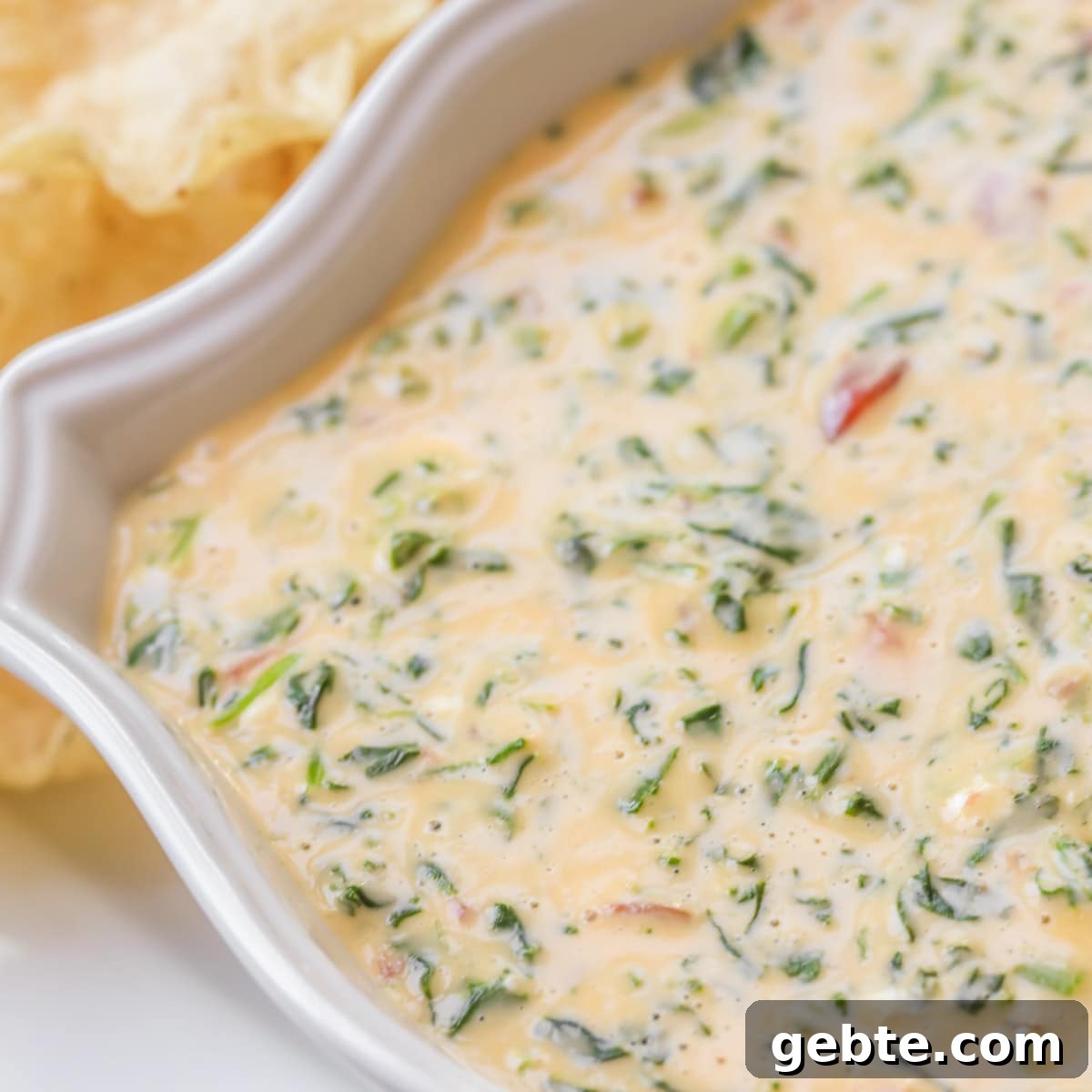 spinach rotel dip in a serving dish