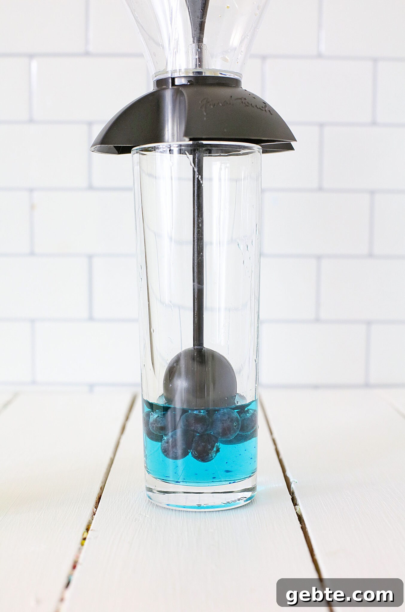 Blueberry Vodka Lemonade Recipe: Refreshing Summer Cocktail 8 Layering tool added to glass