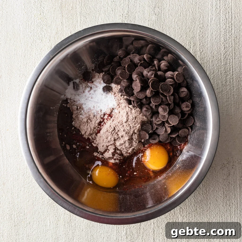 Red Velvet Cake Mix Cookies: Soft, Chewy Cookie Recipe 5 red velvet cake mix cookies ingredients in a bowl