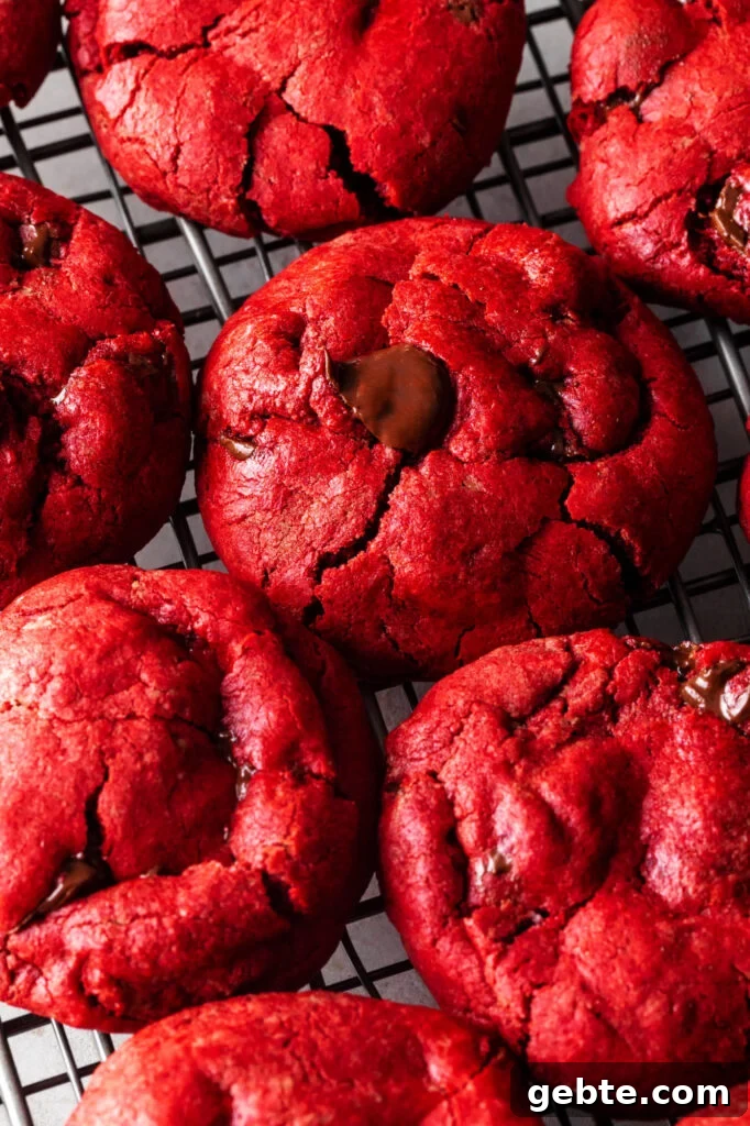 Red Velvet Cake Mix Cookies: Soft, Chewy Cookie Recipe 8 red velvet cake mix cookies ona wire rack