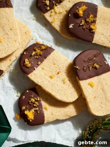 Sourdough Discard Shortbread Cookies on white parchment paper.