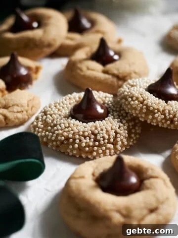 A pile of Sourdough Discard Peanut Butter Blossoms.