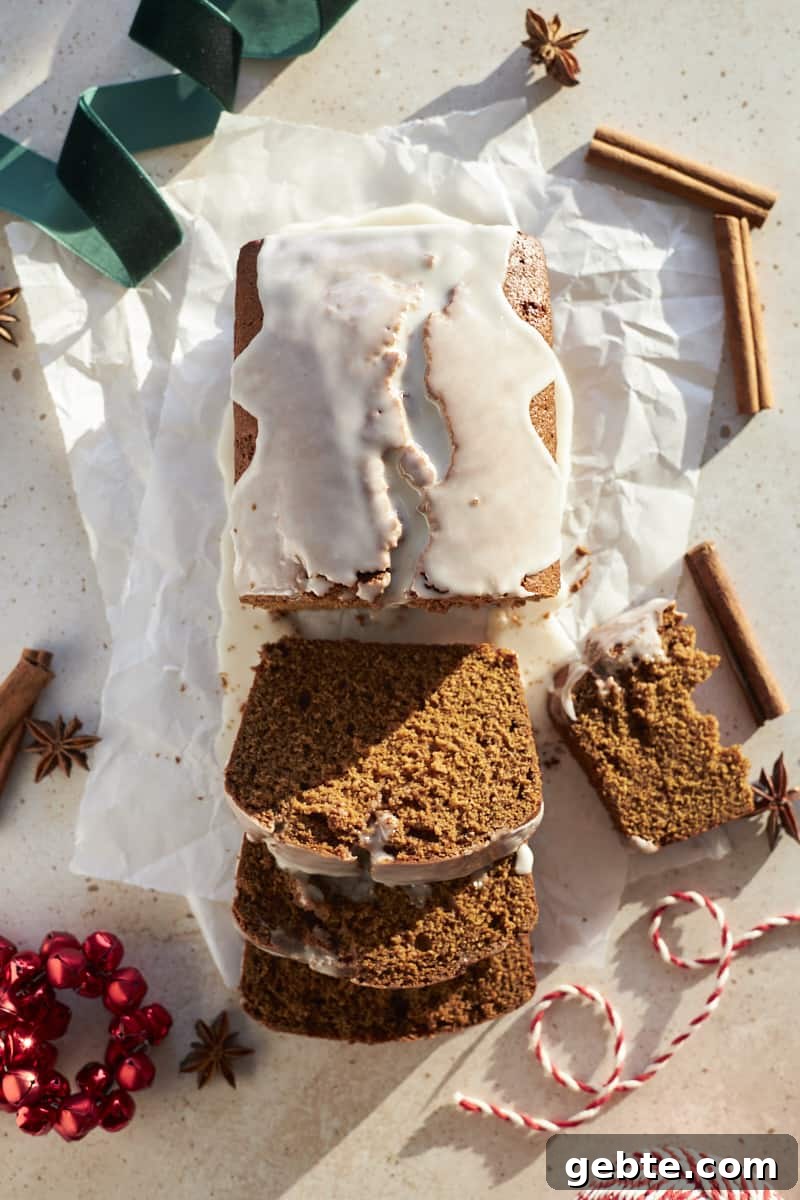 Overhead view of Sourdough Discard Gingerbread Loaf with slices cut.