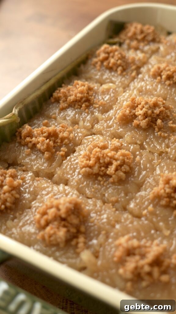 Biko: Filipino Caramelized Sticky Rice Dessert Recipe 10 The full dish of biko portioned into squares and topped with latik (coconut curds)