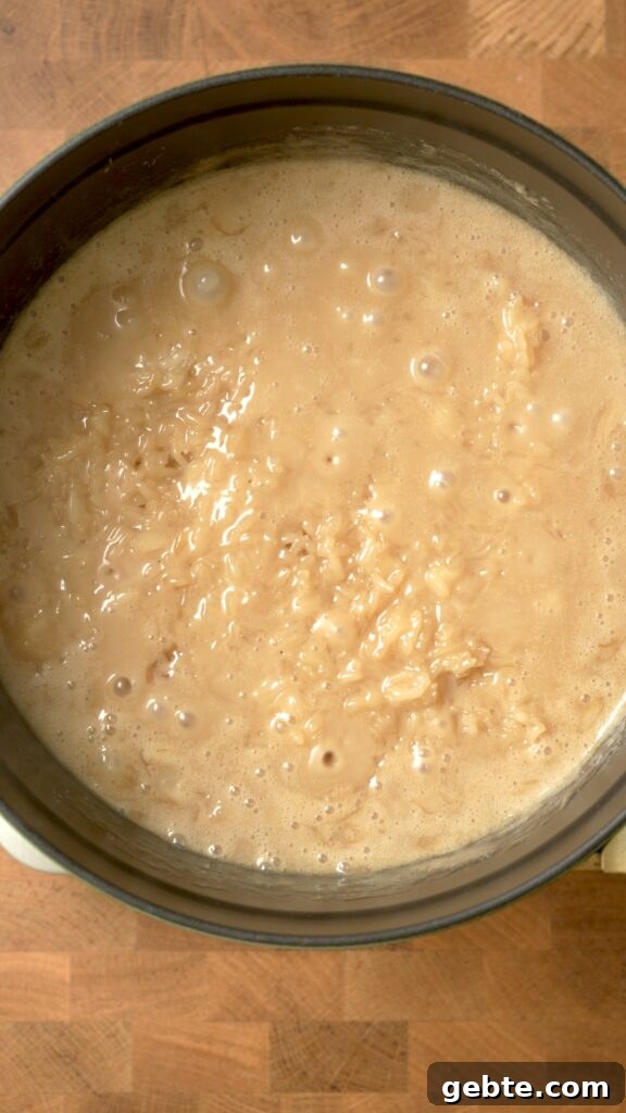 Biko: Filipino Caramelized Sticky Rice Dessert Recipe 6 All the biko ingredients are mixed together and slowly simmered for a while