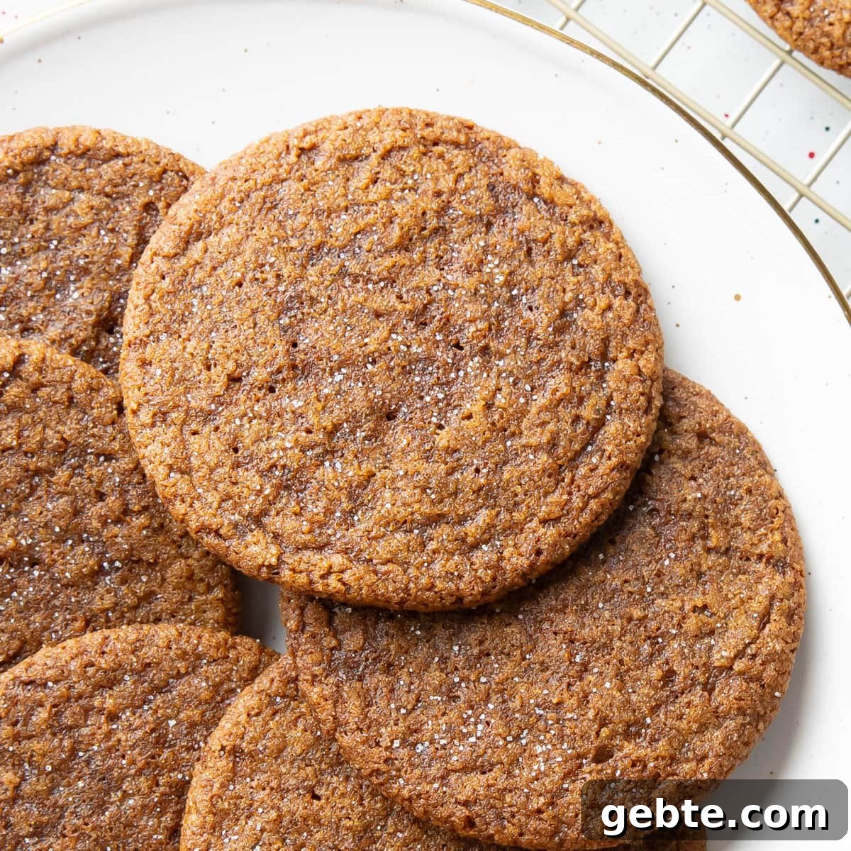 close up of a plate of gingersnaps topped with sugar