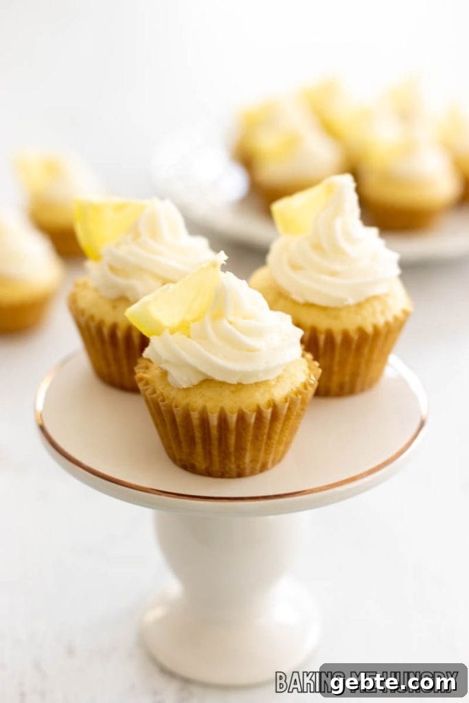 mini lemon cupcakes on pedestal