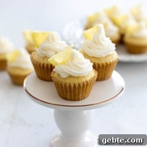 mini lemon cupcakes on pedestal