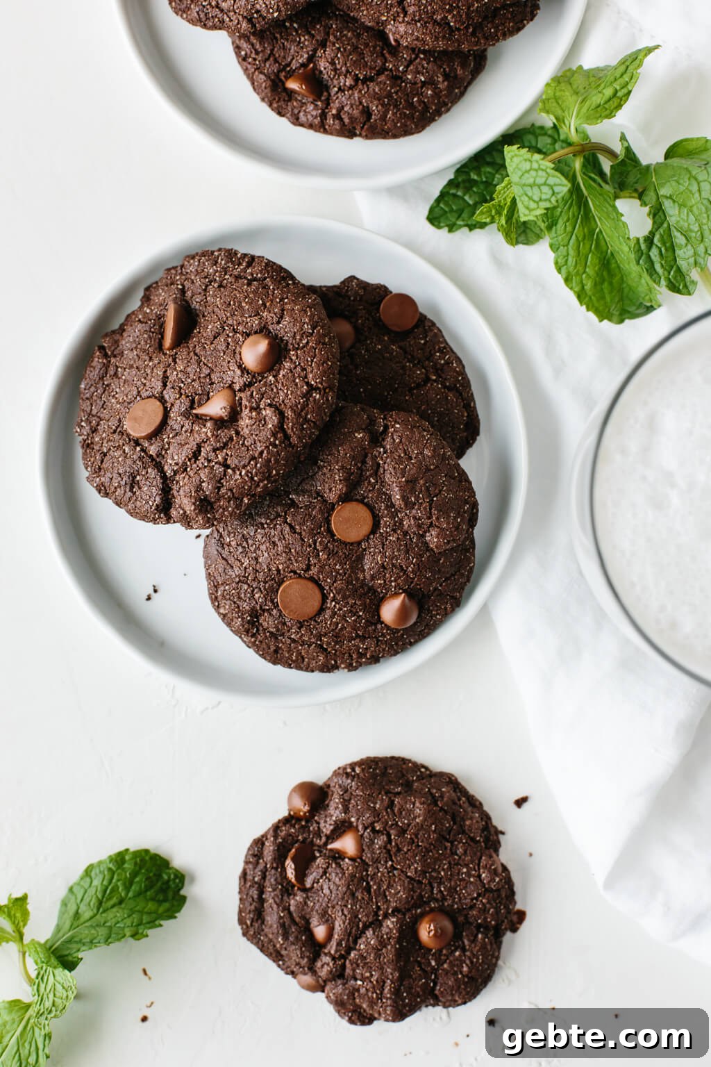 These gluten-free, paleo-friendly mint double chocolate cookies are rich, decadent and highly addictive. They're firm on the outside and lusciously soft on the inside.