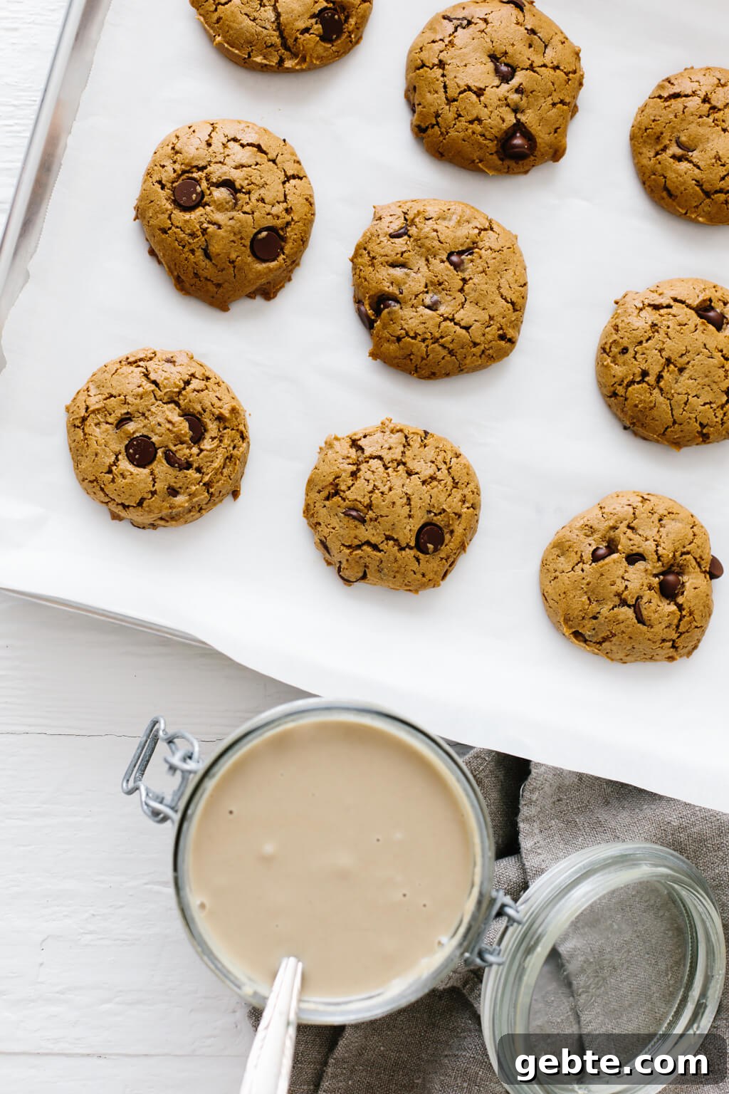 These flourless chocolate chip tahini cookies are gluten-free, nut-free and paleo. They're soft, chewy and utterly delicious. So easy to make! #TahiniCookies #Tahini #ChocolateChipCookies #CookieRecipe #Paleo #GlutenFree