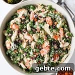 Chicken, broccoli and kale salad served in a bowl.