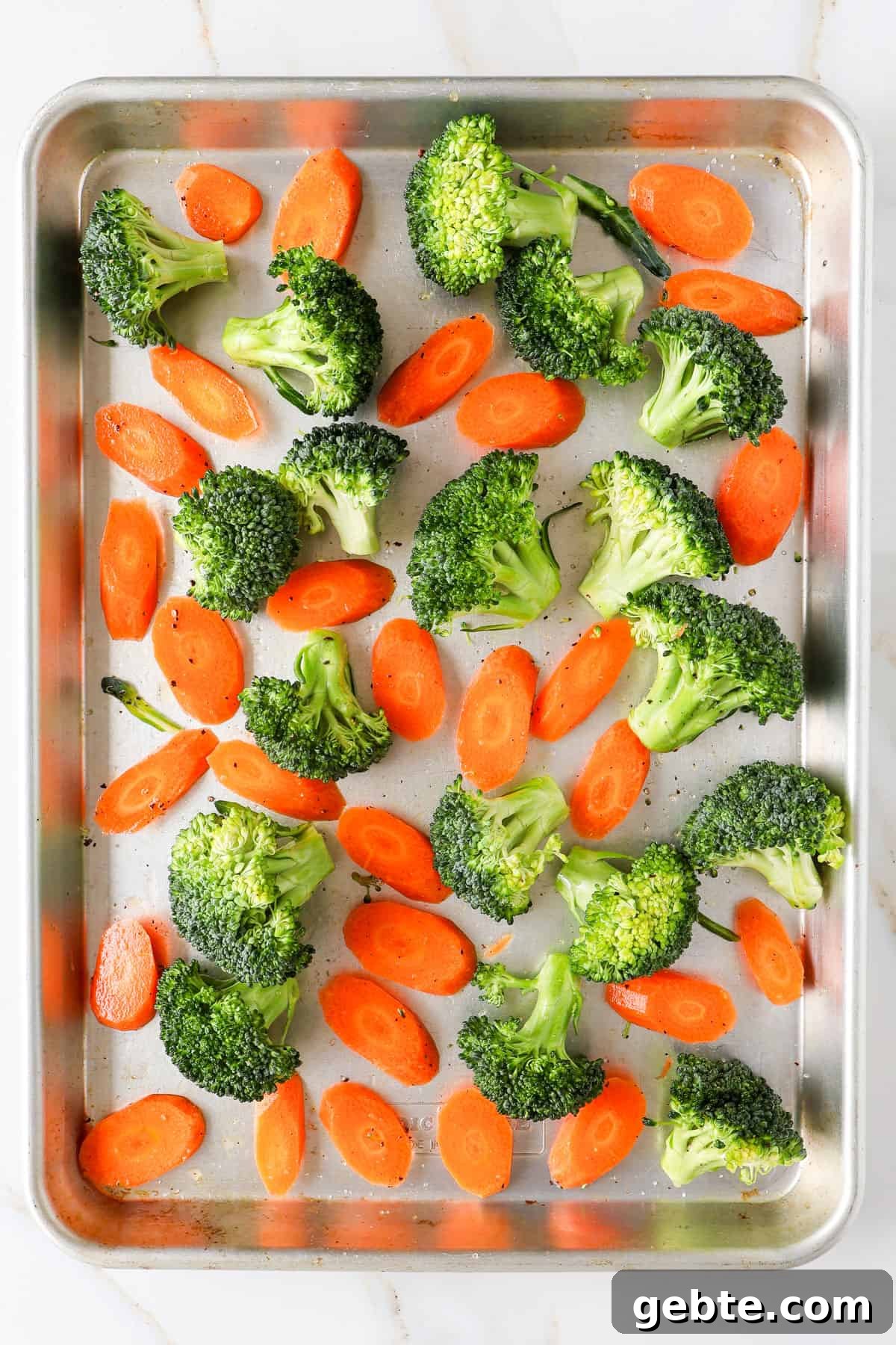 Chicken, Broccoli and Kale Salad with Lemon-Garlic Dressing 5 Roasted broccoli and carrots on baking sheet.
