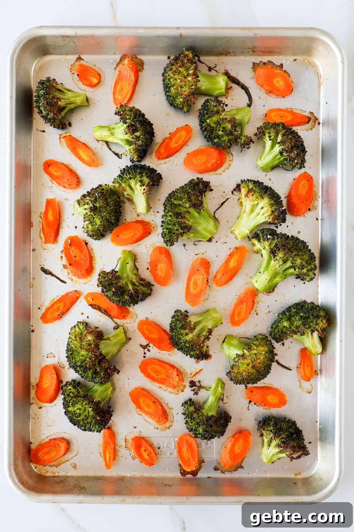Chicken, Broccoli and Kale Salad with Lemon-Garlic Dressing 6 Broccoli and carrots on baking sheet.
