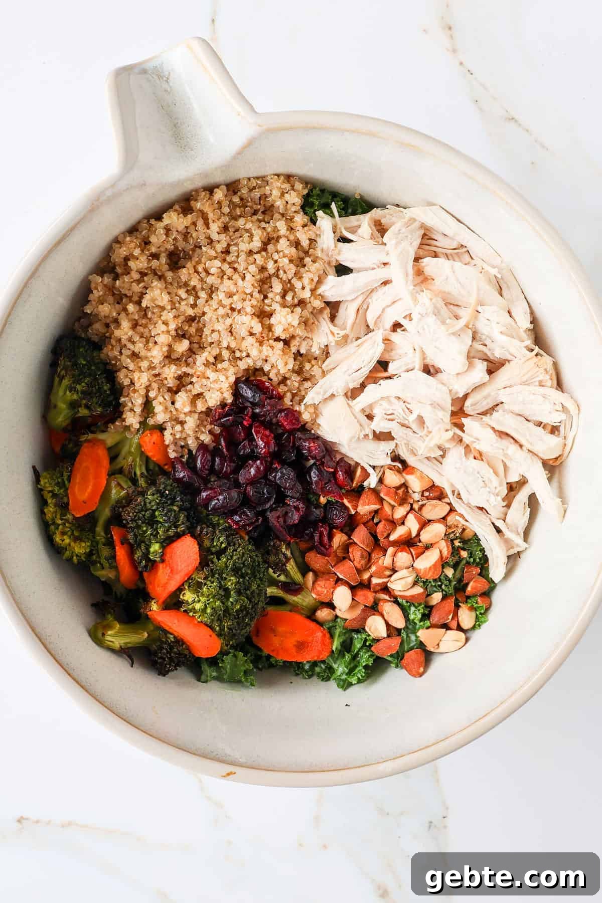 Chicken, Broccoli and Kale Salad with Lemon-Garlic Dressing 8 Ingredients in a mixing bowl.