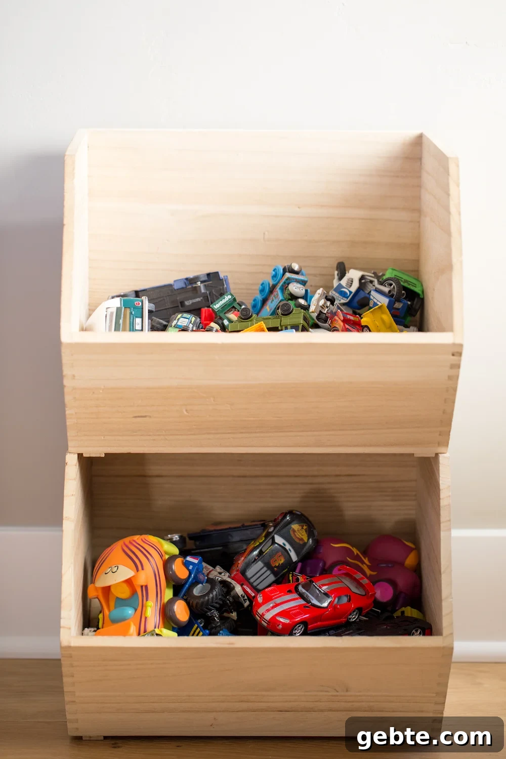 Declutter Toys Quickly: Smart Steps to Organize Kids’ Playroom 6 stacked wooden toy storage boxes with toy cars inside