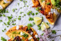 Crispy Baked Shredded Chicken Tacos with Cheesy Filling