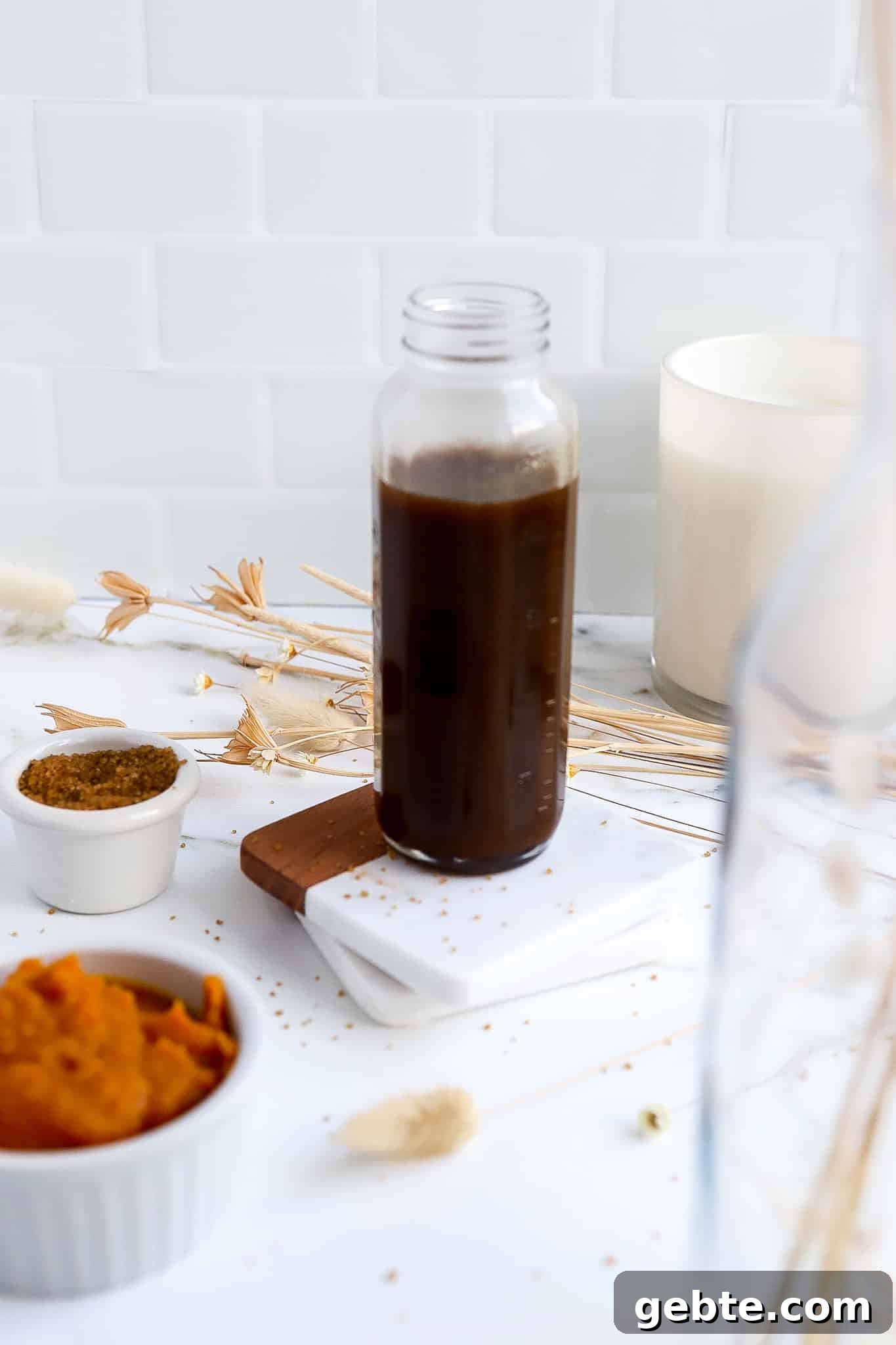 pumpkin coffee syrup recipe in a glass jar for fall