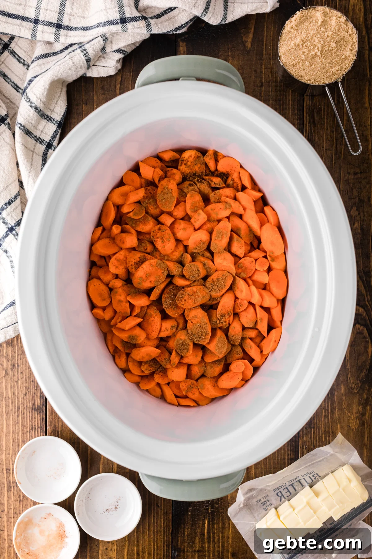 Carrots and spices in a crockpot.