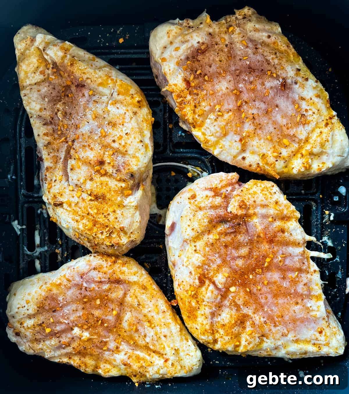 Dry rub applied to the chicken breasts after they were flipped over.
