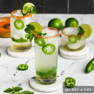 3 spicy mojitos with jalapeno on coasters