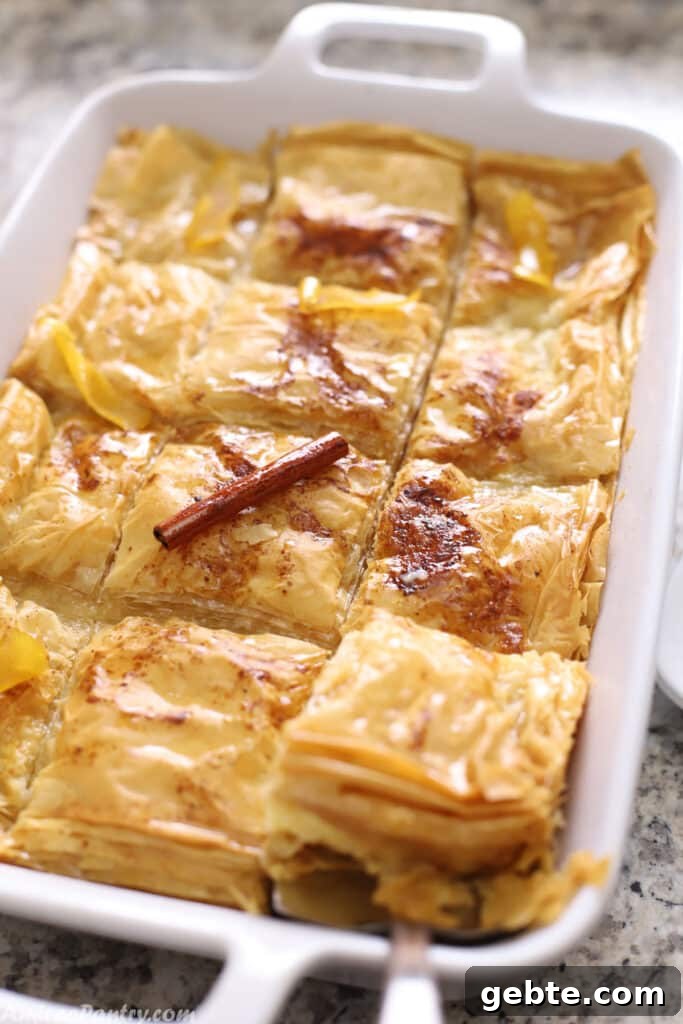 Galaktoboureko in a white oven dish.