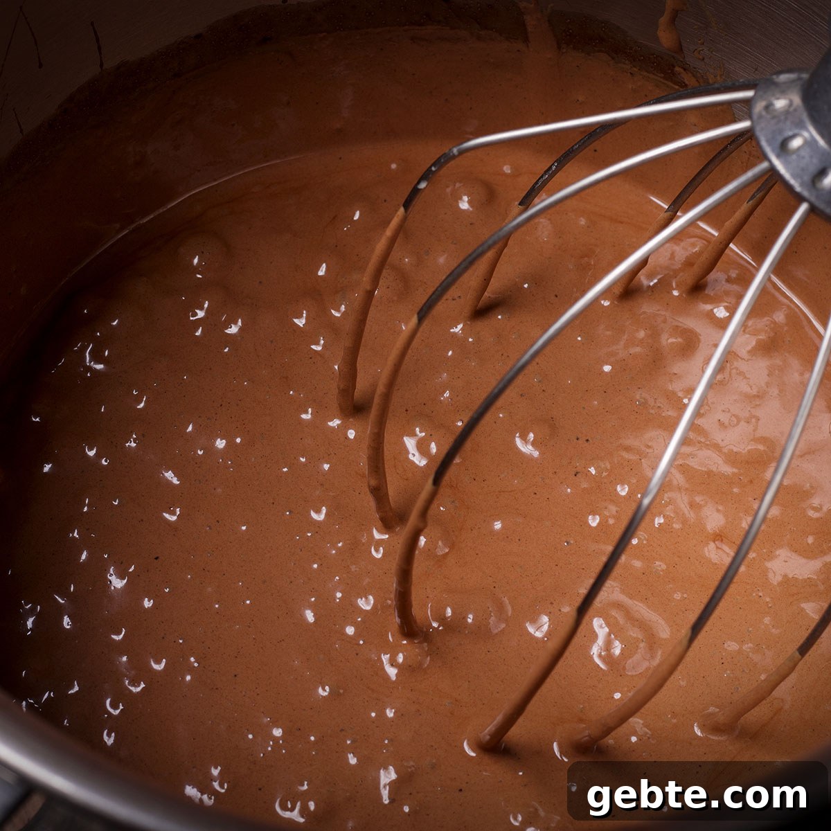 Decadent Chocolate Almond Pie Recipe — Crispy Crust & Rich Filling 9 Beat the batter for this pie with an electric mixer until the batter is aerated and lightened in color.