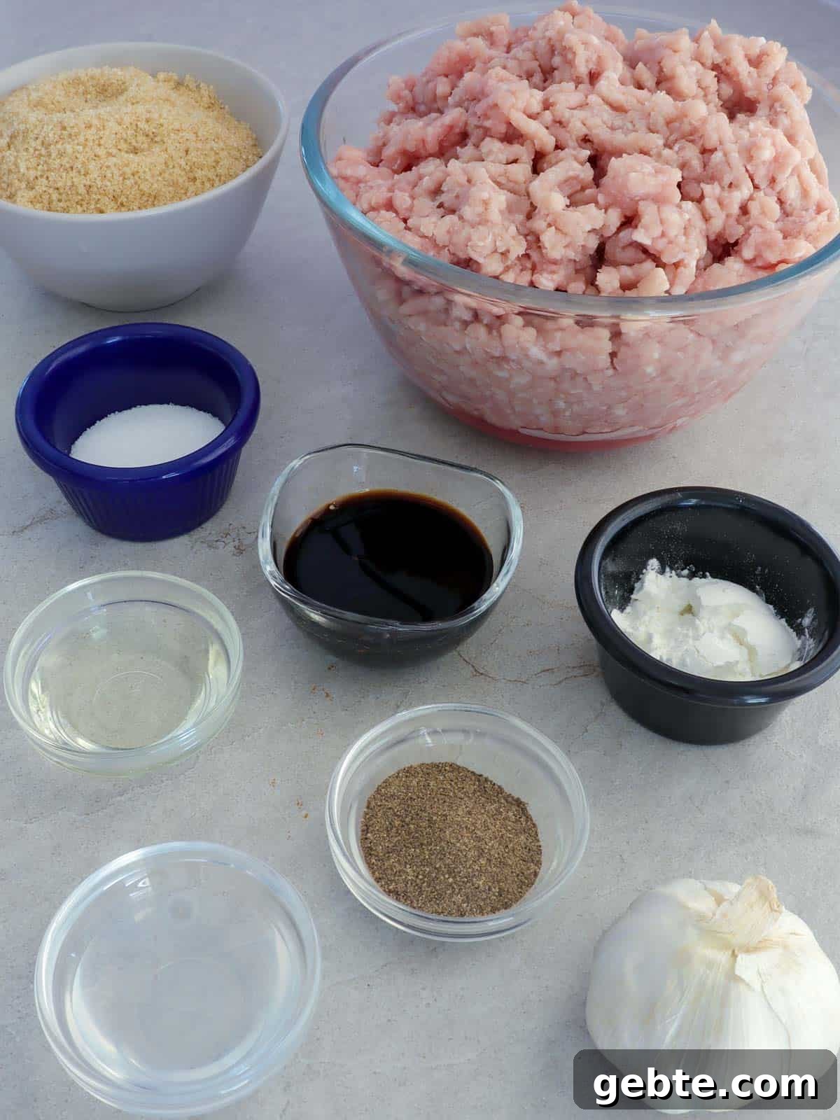 Homemade Skinless Longganisa Recipe: Filipino Sausage Without Casing 3 ground pork, salt, pepper, garlic, brown sugar, cornstarch, soy sauce, oil, water in bowls