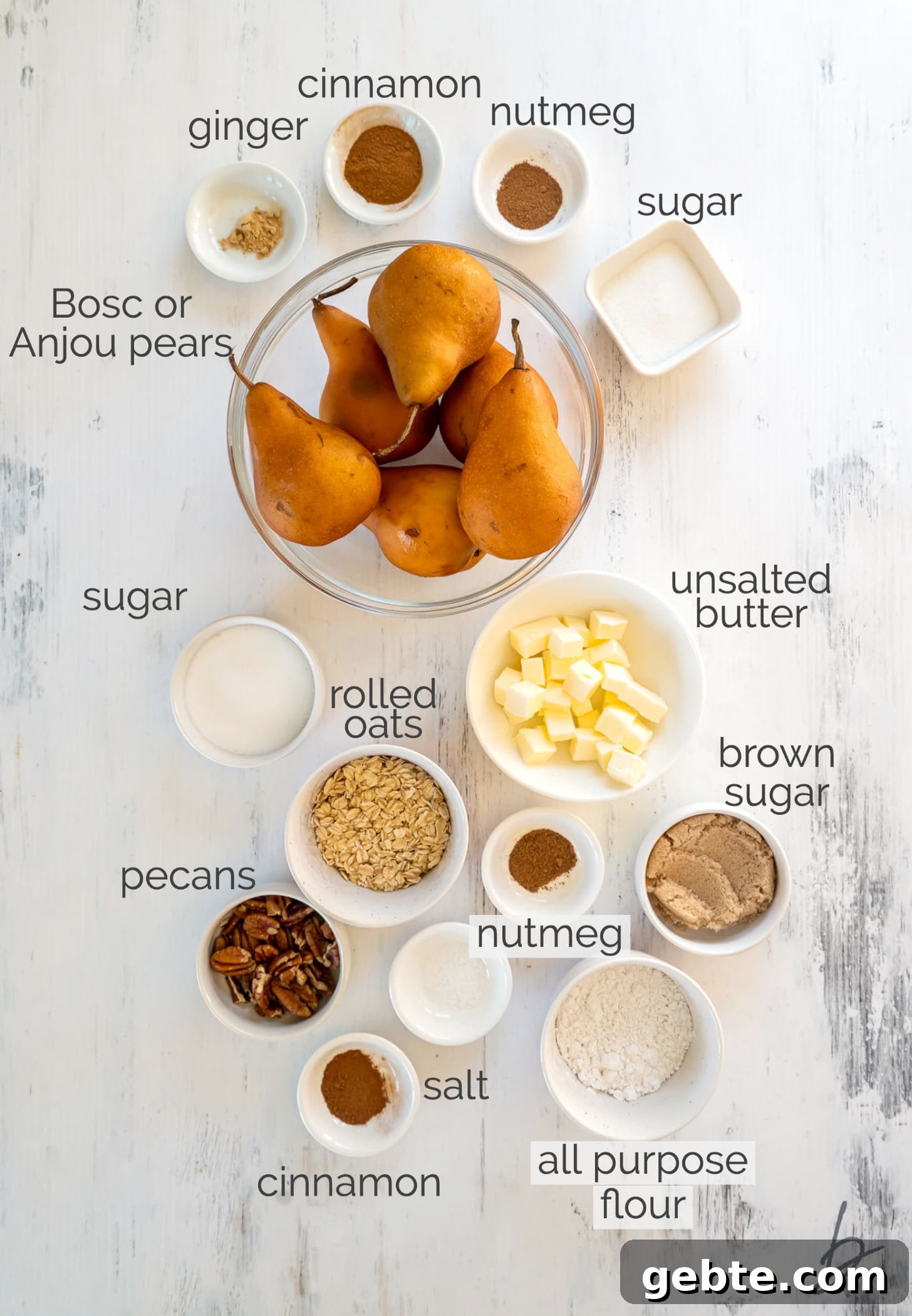 pear crisp ingredients in bowls labeled with text.