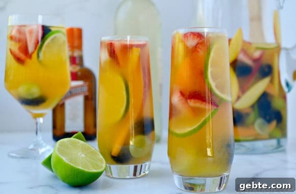 Various glasses filled with the best White Sangria for All Seasons