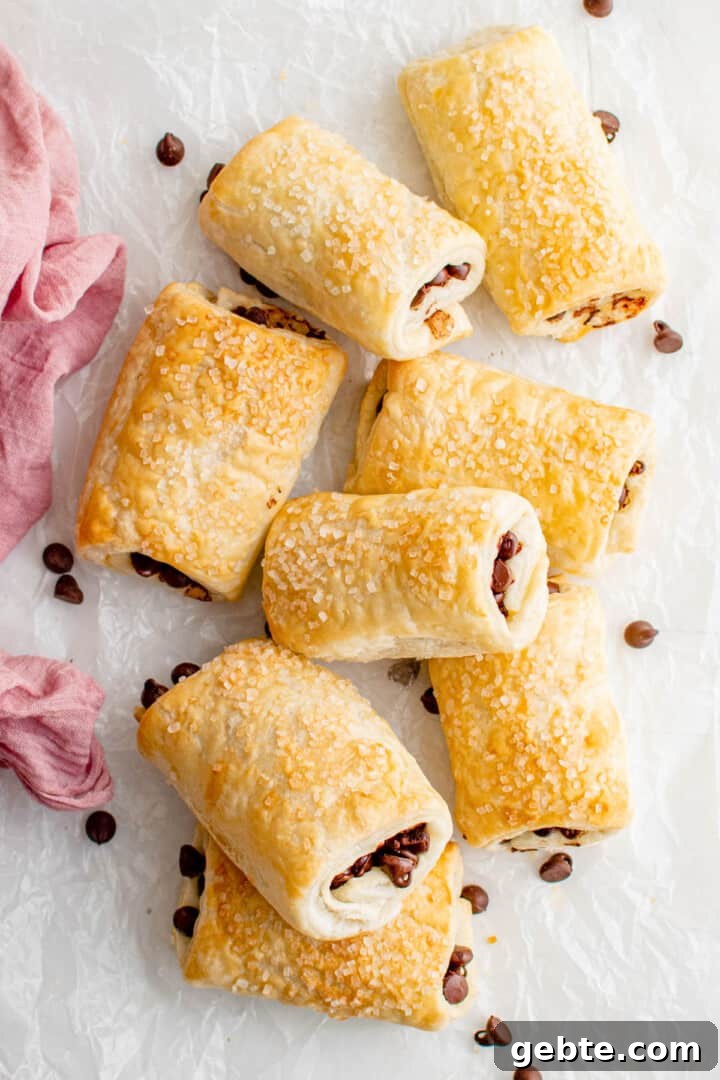 chocolate puff pastries on parchment paper ready for serving.