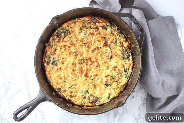 spinach frittata in a cast iron skillet