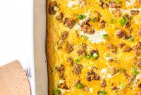 Cheesy Brunch Casserole with Eggs, Cheese, and Herbs