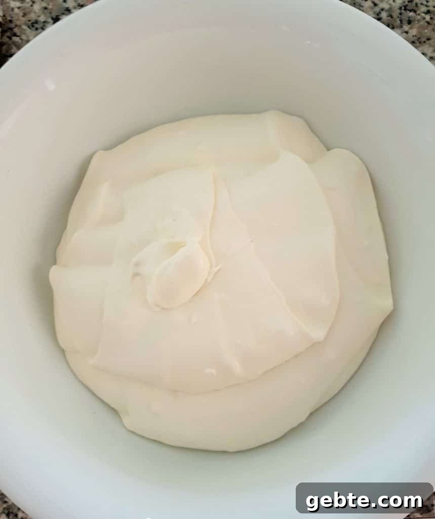 Nutella Cookies and Cream Cheesecake Recipe 12 Vanilla cheesecake in a white bowl