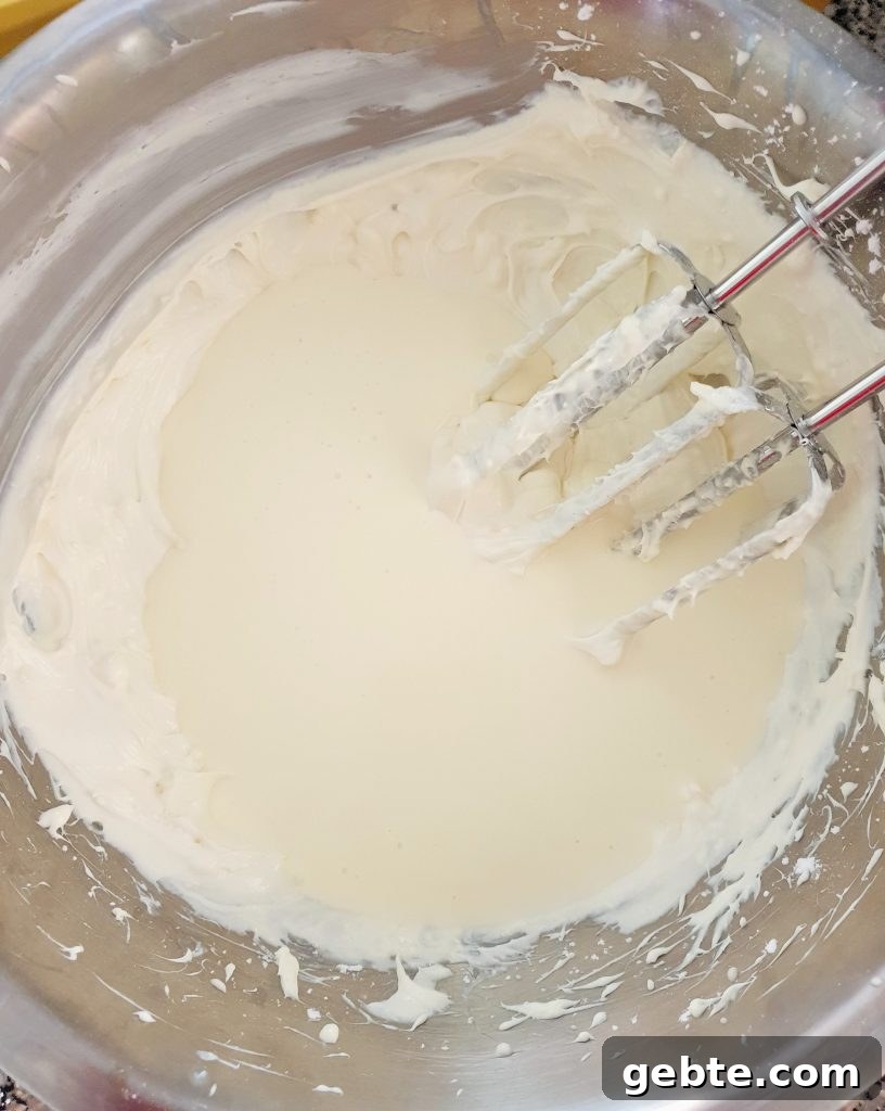 Nutella Cookies and Cream Cheesecake Recipe 10 Cream in a cheesecake mixture.