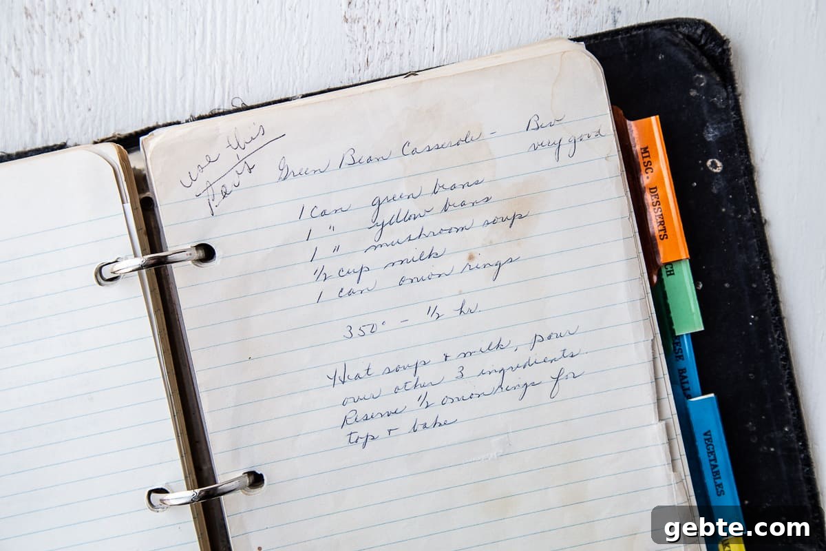 handwritten recipe for green bean casserole on lined notebook paper.