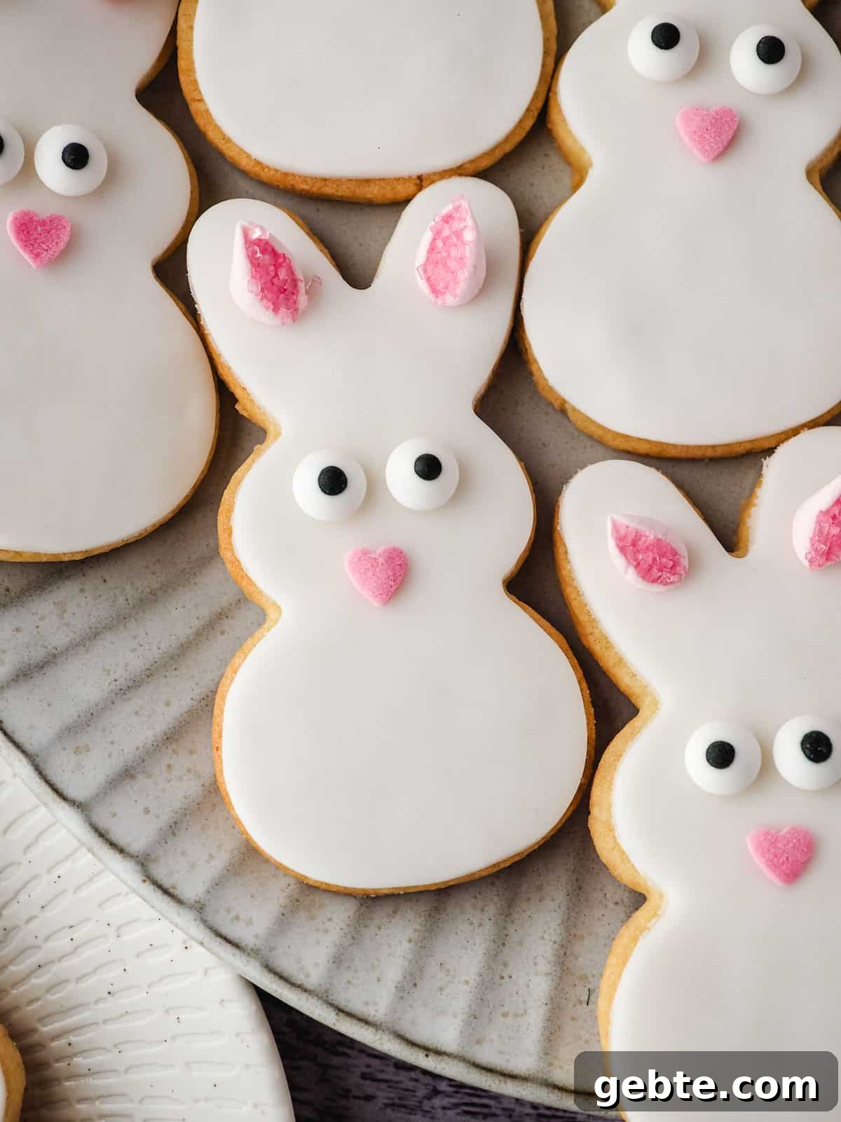 Easter Bunny Cookies Recipe: Step-by-Step Guide 9 Bunny cookies on a plate.