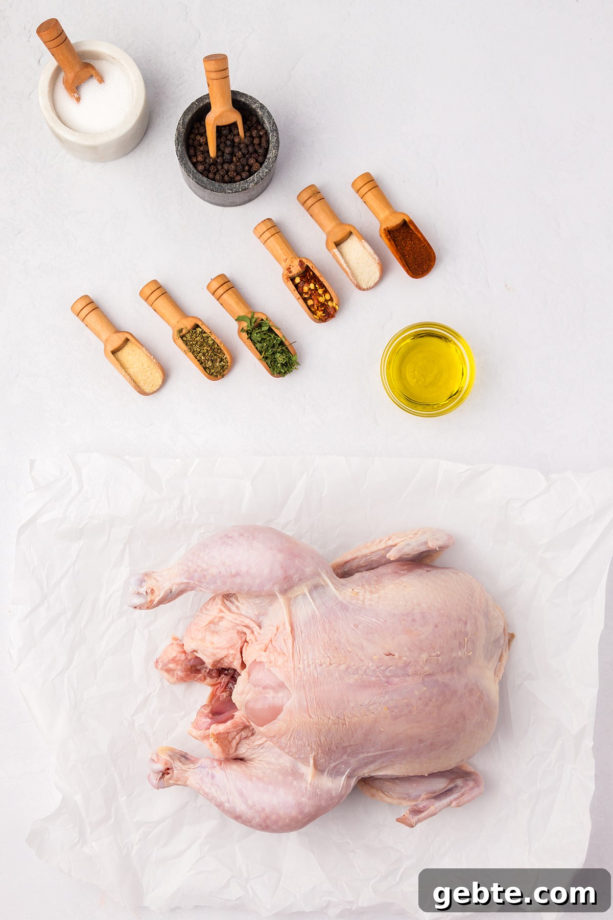 Ingredients to make Air Fryer Whole Chicken set out on counter.