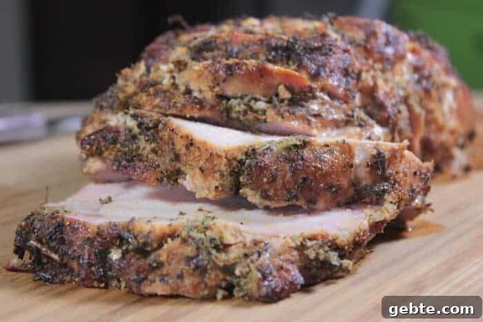 Smoked Pork Loin with Herb Rub 15 Plated smoked pork loin ready to eat