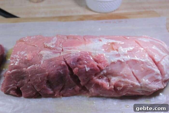 Smoked Pork Loin with Herb Rub 7 Applying oil to pork loin