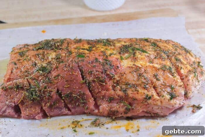 Smoked Pork Loin with Herb Rub 10 Herb-covered pork loin