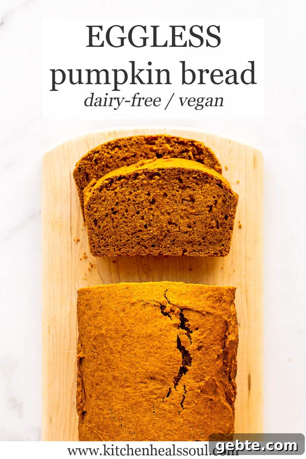 Sliced eggless pumpkin bread on wood cutting board