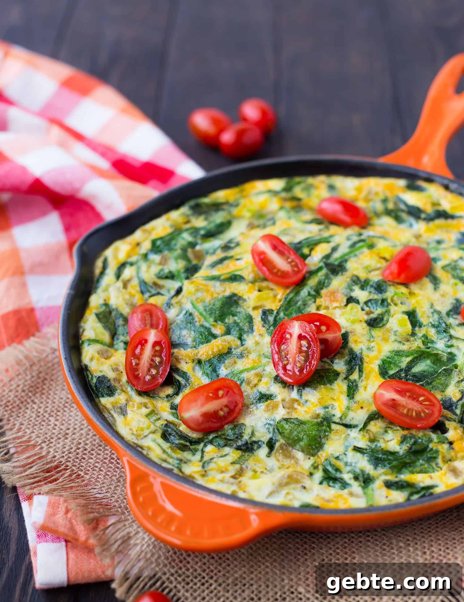 Green Chile Egg White Frittata 2 Egg white frittata topped with tomatoes.
