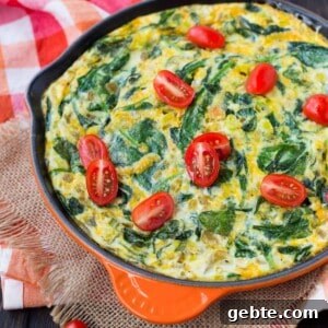 Green Chile Egg White Frittata 9 Egg white frittata topped with tomatoes.