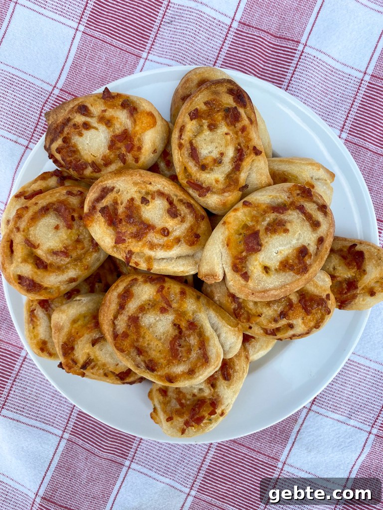 Small pieces of pepperoni wrapped up in pizza dough to make pinwheels and browned nicely while baking.