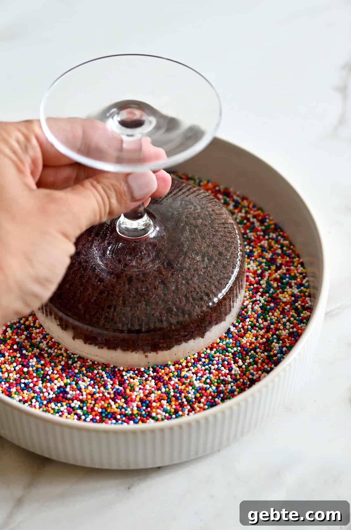 Homemade Polka Dot Cake Recipe 9 Invert a cocktail cake onto nonpareil sprinkles to adhere to the frosting.