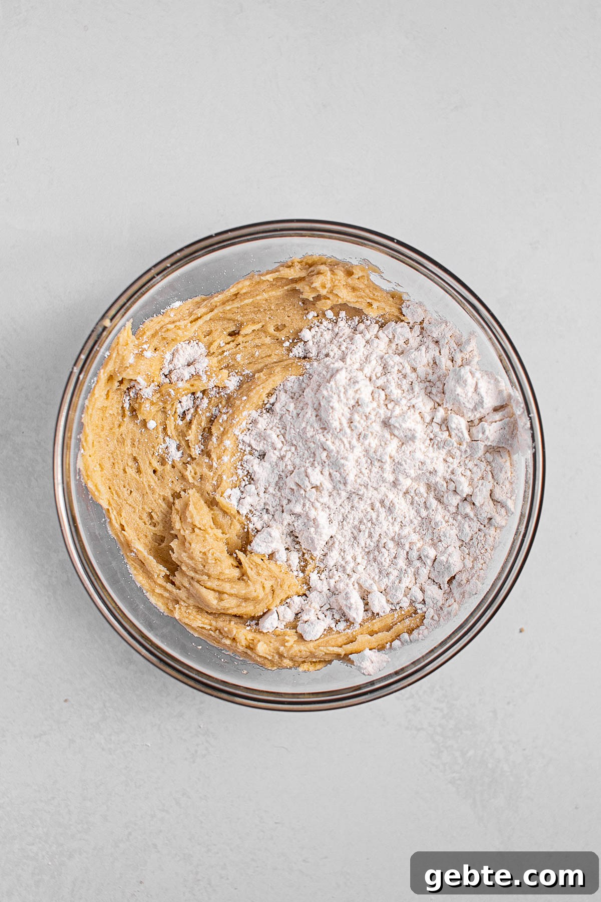 Adding flour to vanilla dough