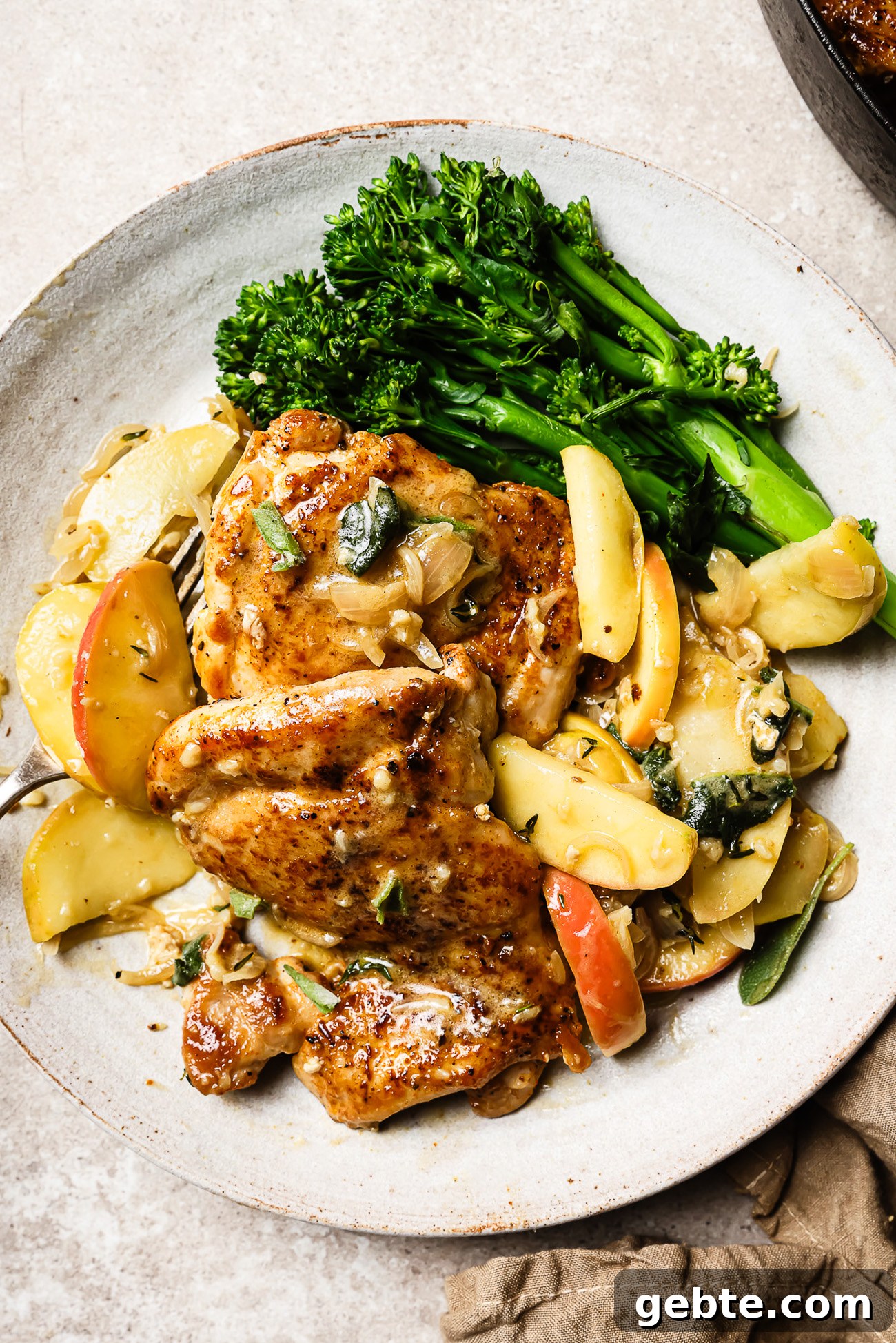 apple cider chicken on a white plate.
